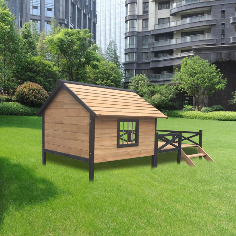 Dog house with sales fenced in area